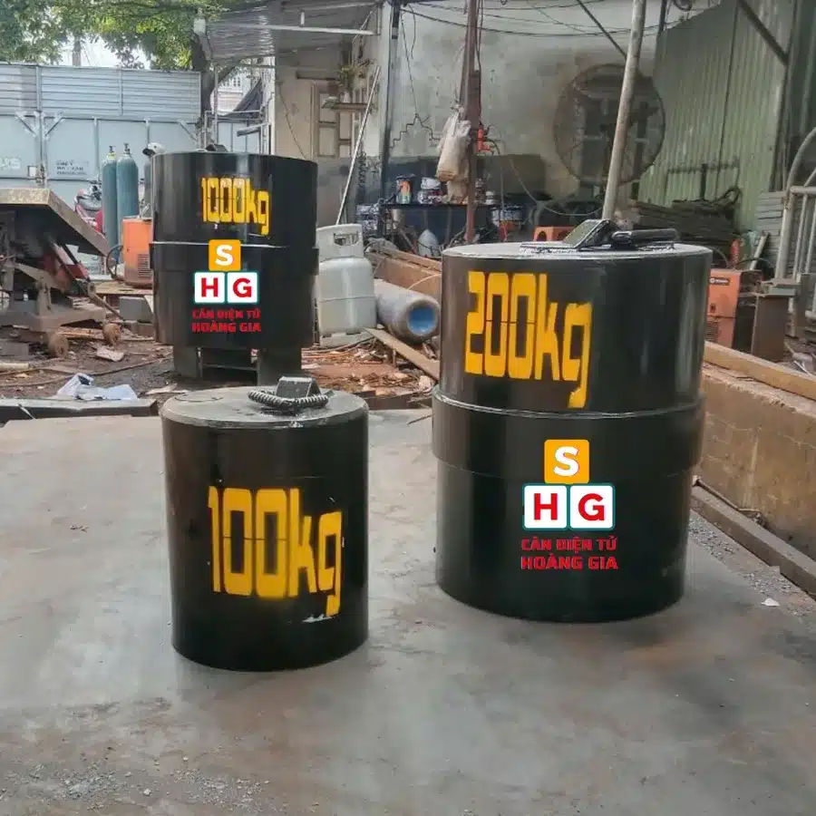 Quả Cân Chuẩn 20kg Giá Bao Nhiêu? Cấp M1, F1, F2, Gang Hay Inox Và Cách Chọn Đúng - Cân điện tử Hoàng Gia | Uy tín 10+ năm, Uy Tín, Giá Tốt qua can 100kg 200kg 500kg 1000kg jpg - Cân điện tử Hoàng Gia | Uy tín 10+ năm, Uy Tín, Giá Tốt